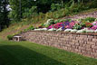 Long Retaining Block Wall with Flower Bed [ANGLE 1]